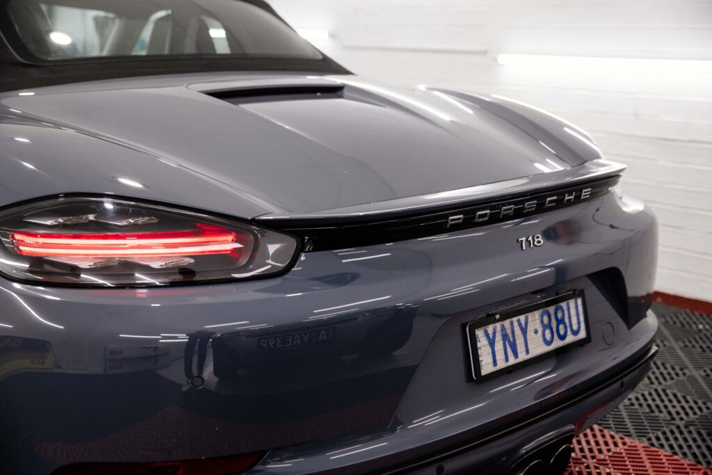 Close-up of the rear of a silver Porsche 718 Boxster